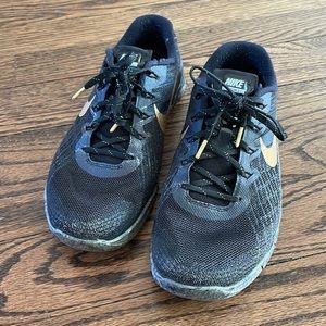 Black and gold Nike metcon 3
